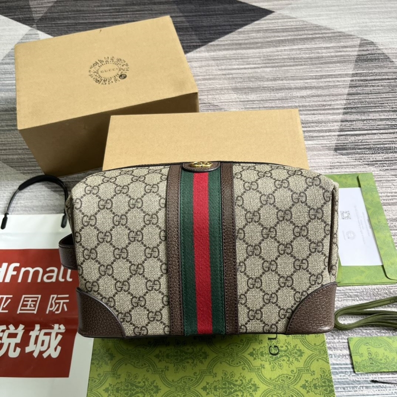 G*u*i cosmetic bags